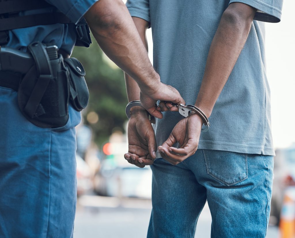 handcuffs-police-and-hands-of-police-man-with-cri-2026-01-09-10-42-36-utc-1024x825